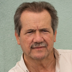 Dr. Carlos De Castro